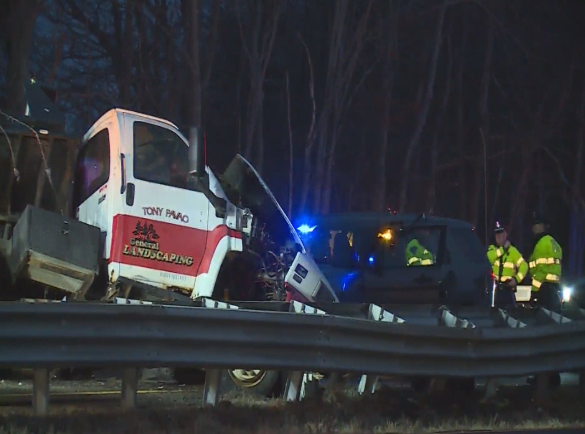 Scene of multi-vehicle crash on Route 24 South in Fall River. Private sander truck lost tire, flipped over