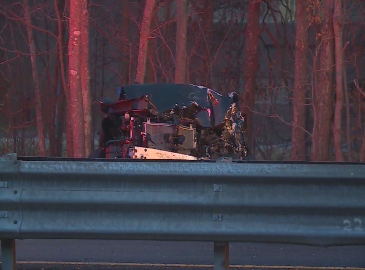 Scene of multi-vehicle crash on Route 24 South in Fall River. Private sander truck lost tire, flipped over