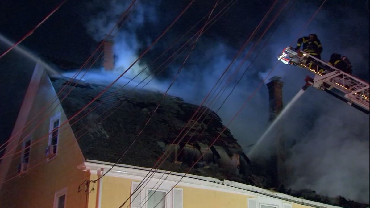 Roof collapses after fire destroys Newton house.    