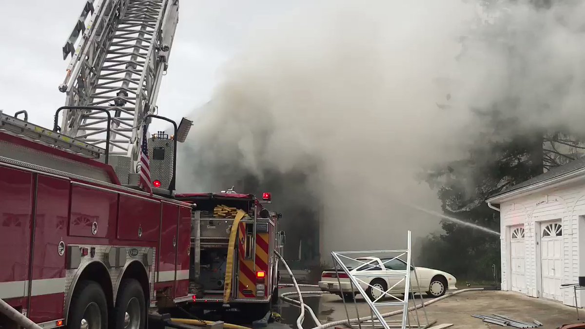 Danvers Fire Dept fighting a three story barn fire on Spring Street. Flames are out but still a lot of smoke