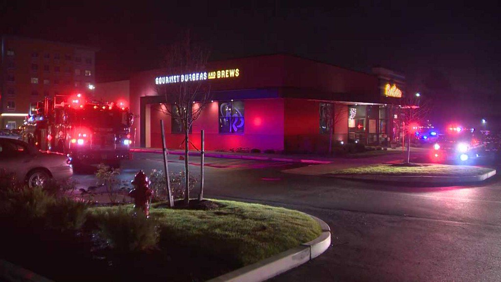 The Red Robin restaurant in Woburn was evacuated Tuesday because of a chemical reaction inside the restaurant