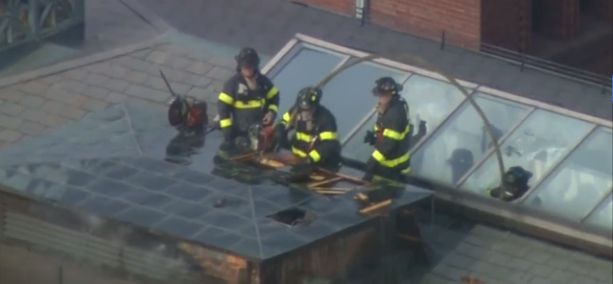 Firefighters respond to a fire in a classroom building on Harvard University campus