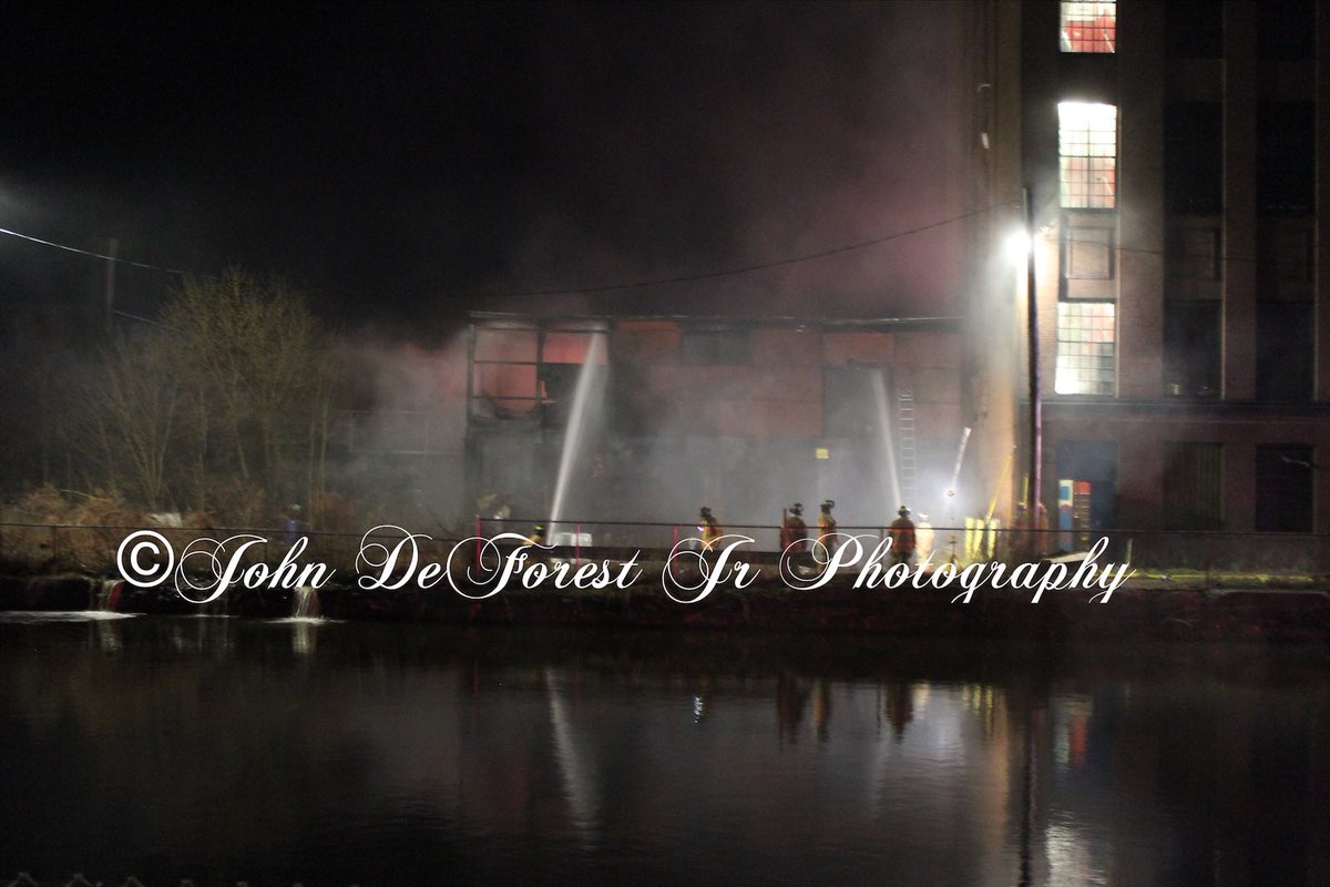 Holyoke ma FF's were called to 108 Cabot Street On 4-1-20 just before 10:30pm for a building fire. Upon arrival crews found a 2 story vacant loading dock area building attached to a 4 story mill well involved and a 2nd alarm was called.
