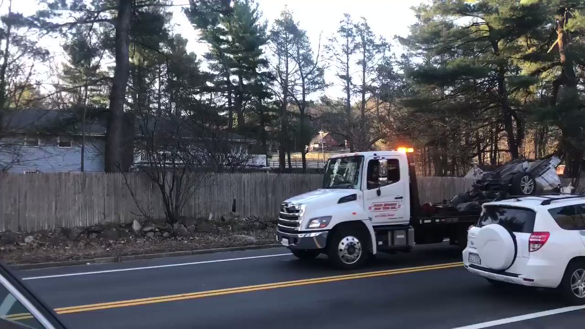 The car was just towed away in two pieces from Blue Hill Ave in Milton