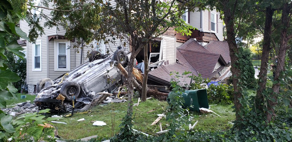 Car crashed into house porch in Attleboro at West St and Ashton Rd. Chief said no one inside house was hurt. Driver was conscious but taken to hospital
