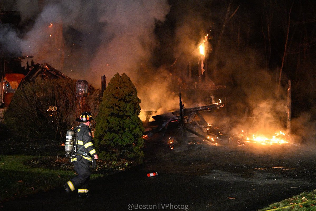 Boxford - 31B Hunters Rd - 4th alarm fire in a garage that extended to the house. Companies having major water problems. Tankers brought into the scene. All companies working