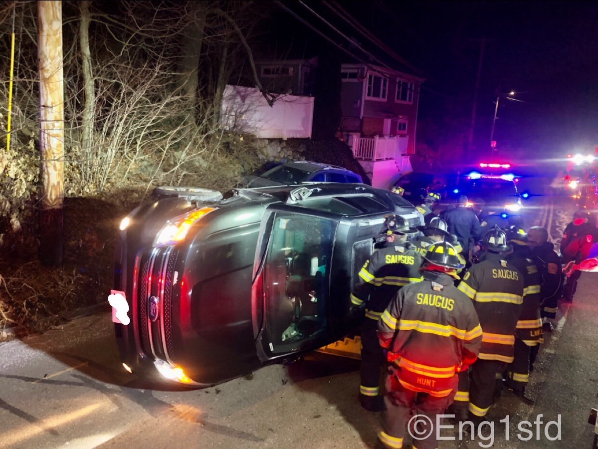 Saugus MA, Central St & Pearl RD an SUV struck a parked car and flipped on its side, Fire fighters removed the sun roof of the vehicle and extricated the single occupant (driver) out that sustained minor injuries