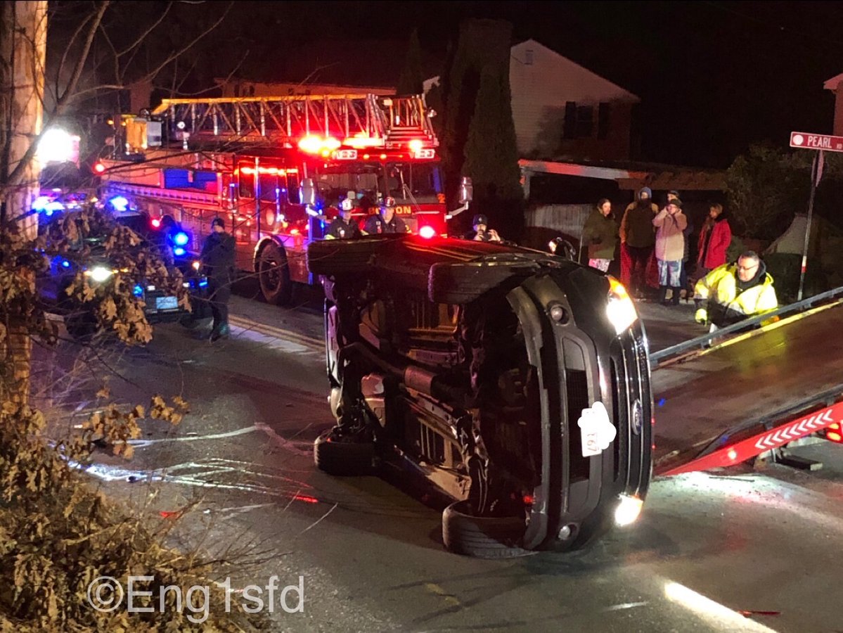 Saugus MA, Central St & Pearl RD an SUV struck a parked car and flipped on its side, Fire fighters removed the sun roof of the vehicle and extricated the single occupant (driver) out that sustained minor injuries