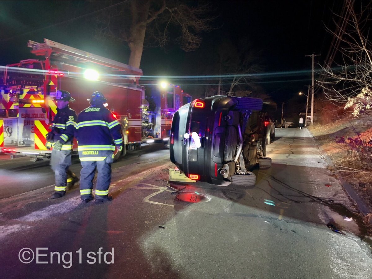 Saugus MA, Central St & Pearl RD an SUV struck a parked car and flipped on its side, Fire fighters removed the sun roof of the vehicle and extricated the single occupant (driver) out that sustained minor injuries