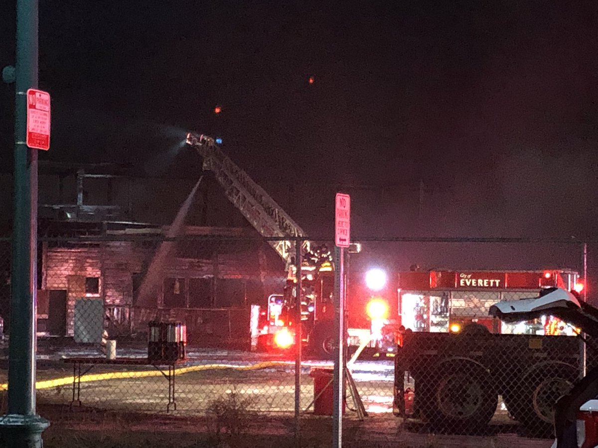 Firefighters in Everett still putting out hotspots at the Duncan Galvanizing warehouse. The building had been vacant for over a year and was set to be demolished