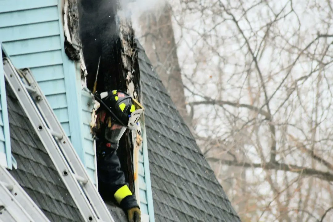 Lawrence Firefighter's along with Mutual Aid Companies working at a residential fire on Swan St