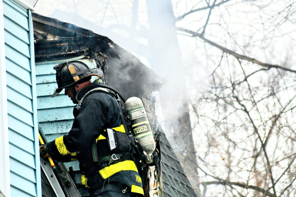 Lawrence Firefighter's along with Mutual Aid Companies working at a residential fire on Swan St