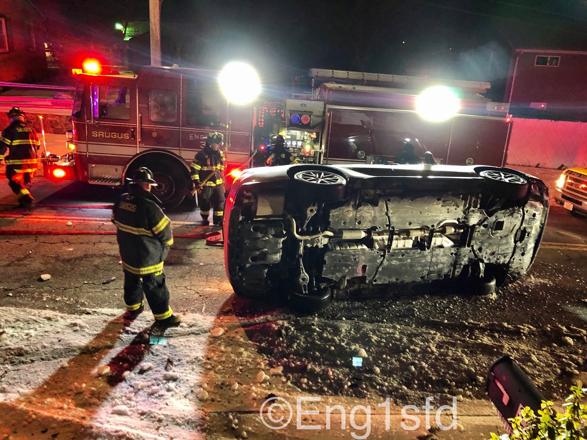 Saugus MA, 2 car accident @ 39 Elm Street with one car flipped on its side with the driver trapped. Fire fighters stabilized the car and extricated the driver that sustained minor injuries and was transported to the hospital. occupants of the other car were not injured