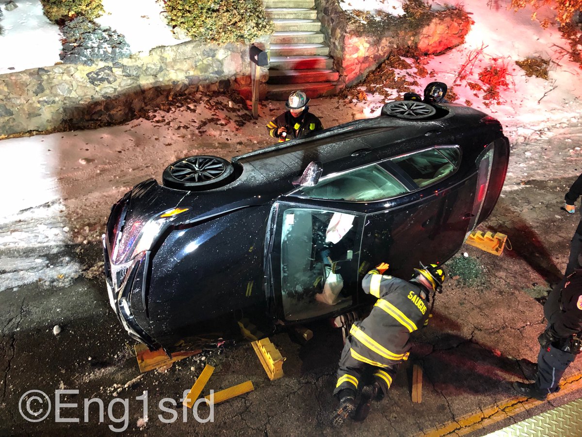 Saugus MA, 2 car accident @ 39 Elm Street with one car flipped on its side with the driver trapped. Fire fighters stabilized the car and extricated the driver that sustained minor injuries and was transported to the hospital. occupants of the other car were not injured