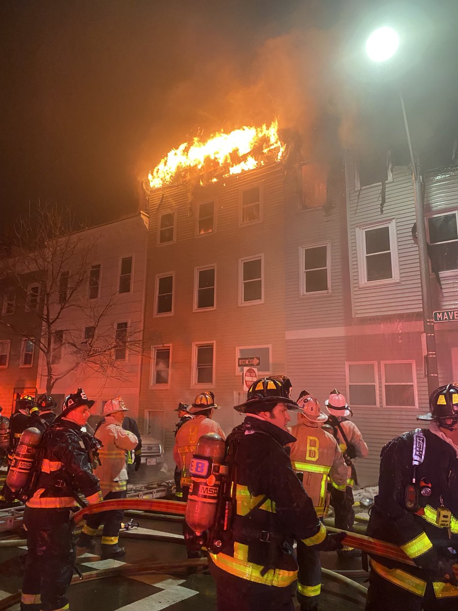 Firefighters are battling heavy fire in a large building on Maverick St in EastBoston this morning.