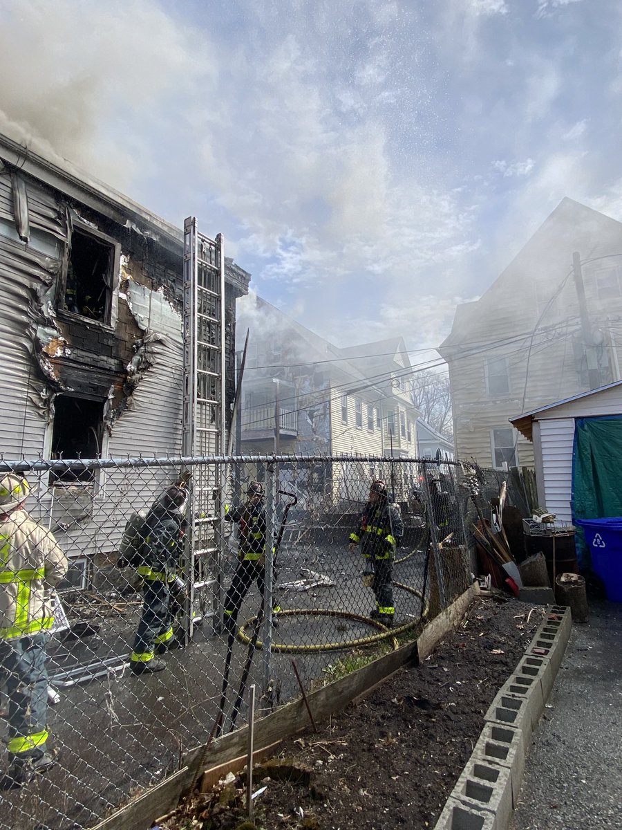 Boston Fire Dept.:The rear porches have collapsed the are 2 exposure buildings on Corona St. Companies are  dealing with live wires in the rear of the building. A 4th alarm has been ordered