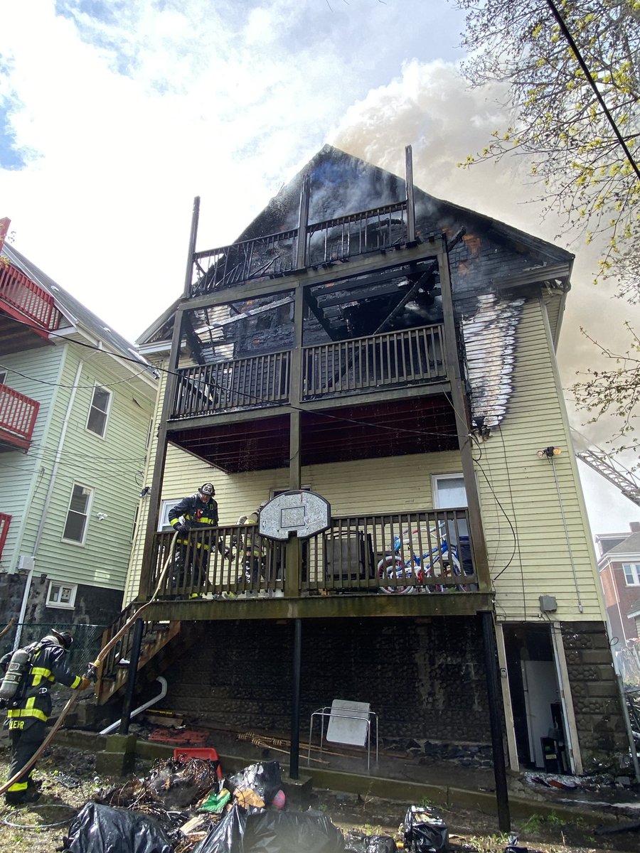 Boston Fire Dept.:All companies are ordered off the 3rd floor rear porches as the fire has burned thru