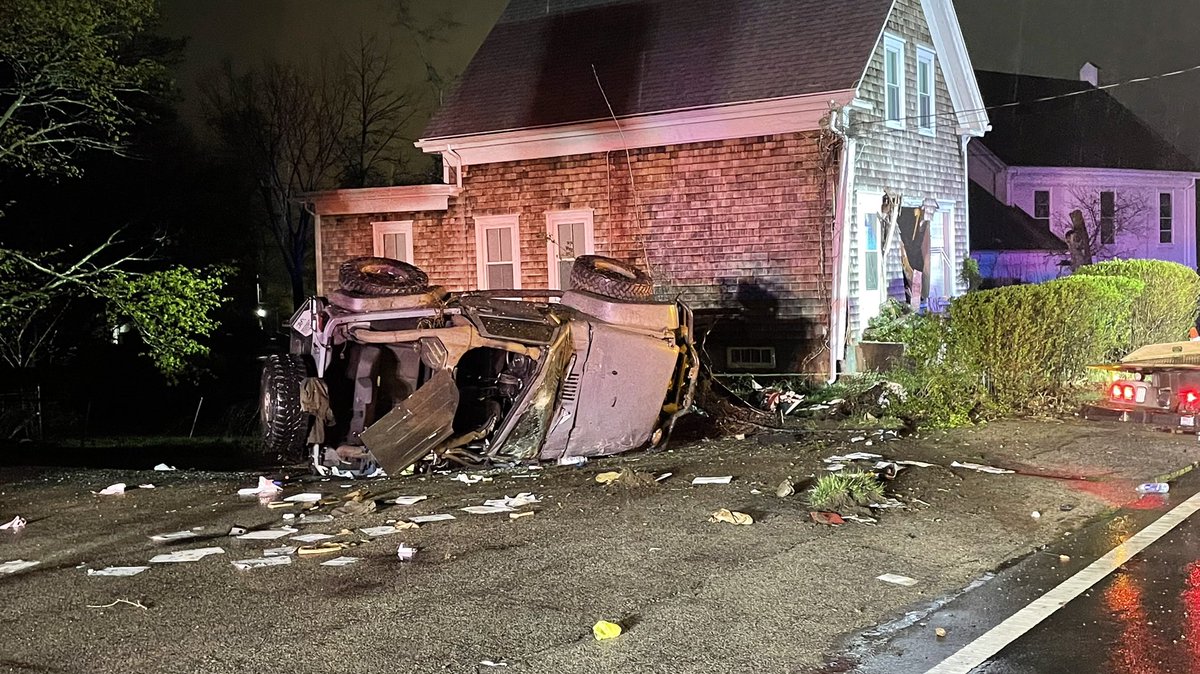 Scene Weymouth, Jeep vs house on Bridge St. Driver fled, no injuries to the occupants of the house