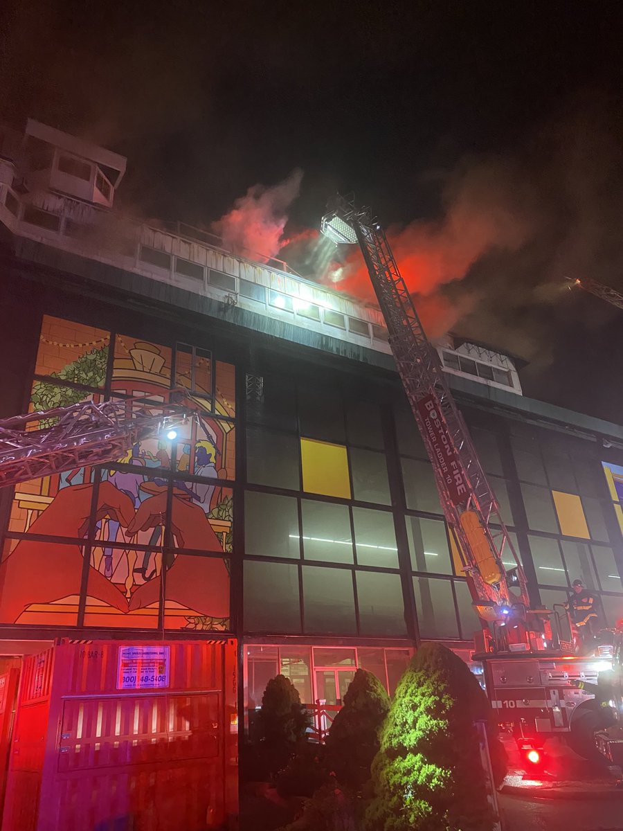 Boston Fire Dept.:A 5th alarm has been ordered,companies are relay pumping to supply water to the fire , because of the limited water supply in the area