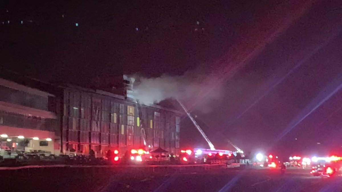 Starting to see some flames poke through the grandstand here at Suffolk Downs. 