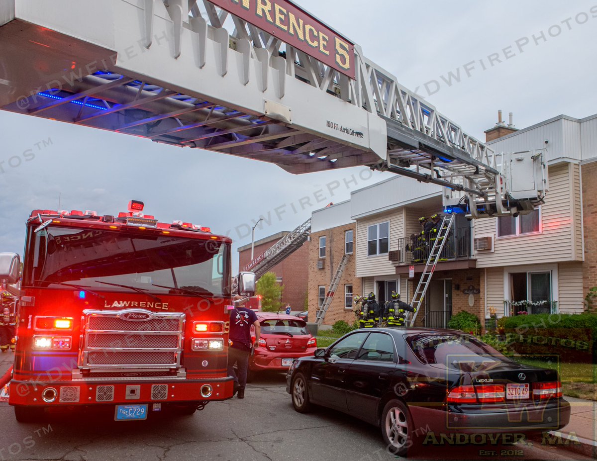 Lawrence 2nd alarm this evening at 40 White St, the Parkside West Apartments. Smoke showing from & fire in an apt on floor 1 w a victim removed. 2nd victim from floor 2 sheltered in place on the balcony w FD/EMS personnel until she could be safely removed. Both transported to LGH