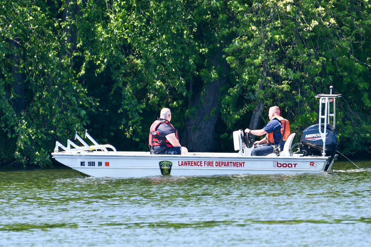 Firefighters conducting water search in the Merrimack River above the falls for missing person