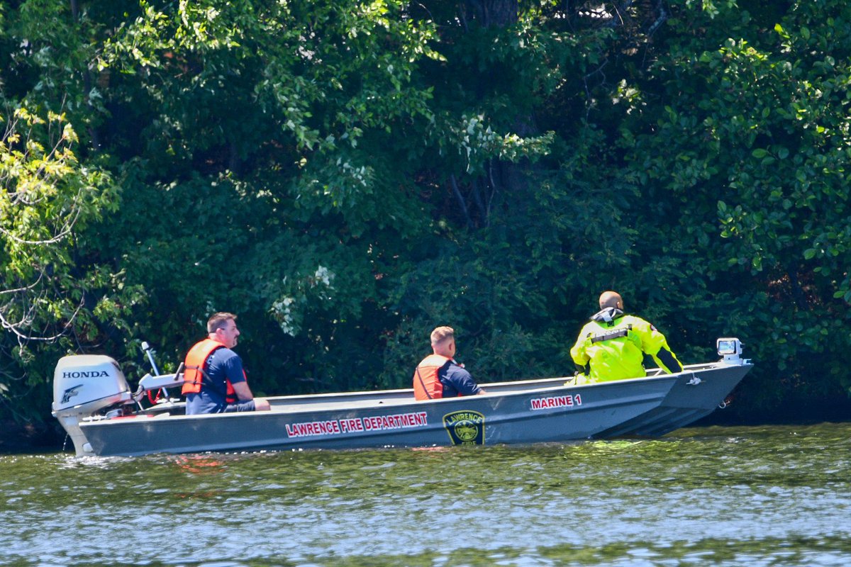 Firefighters conducting water search in the Merrimack River above the falls for missing person