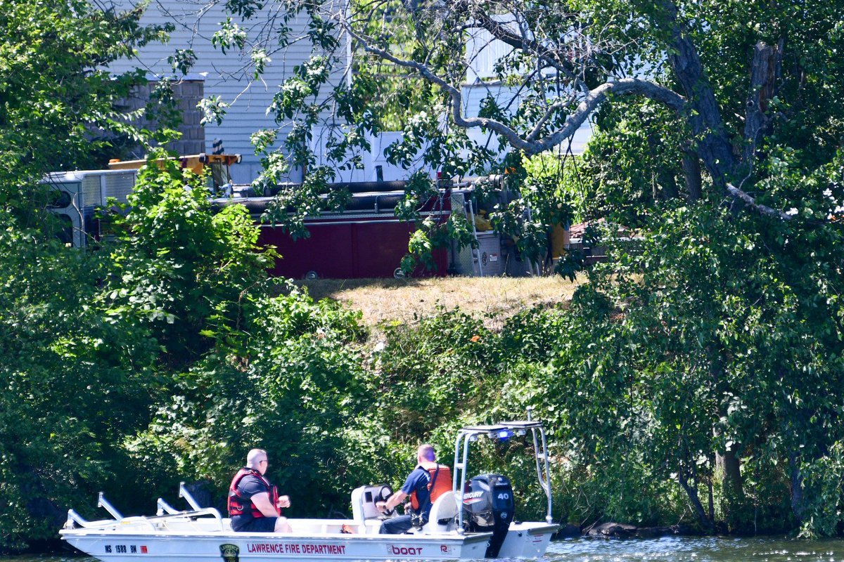 Firefighters conducting water search in the Merrimack River above the falls for missing person