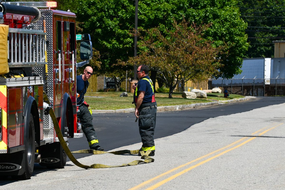 Lawrence E6 from Tower Hill handling a mulch fire on Glenn St while other companies are working at a water incident