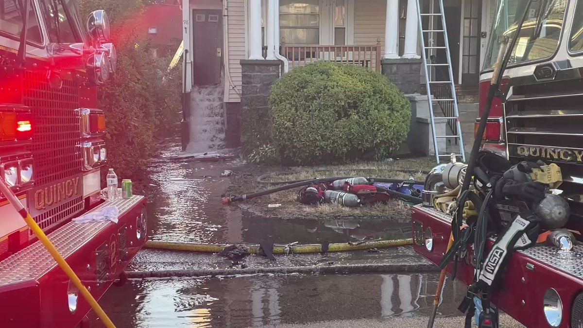 Firefighters continuing to shoot tons of water onto this home, nearly 4 hours after it fire started. A resident here tells a woman jumped from her first floor window to safety. Quincy Fire Chief says this home is a total loss.