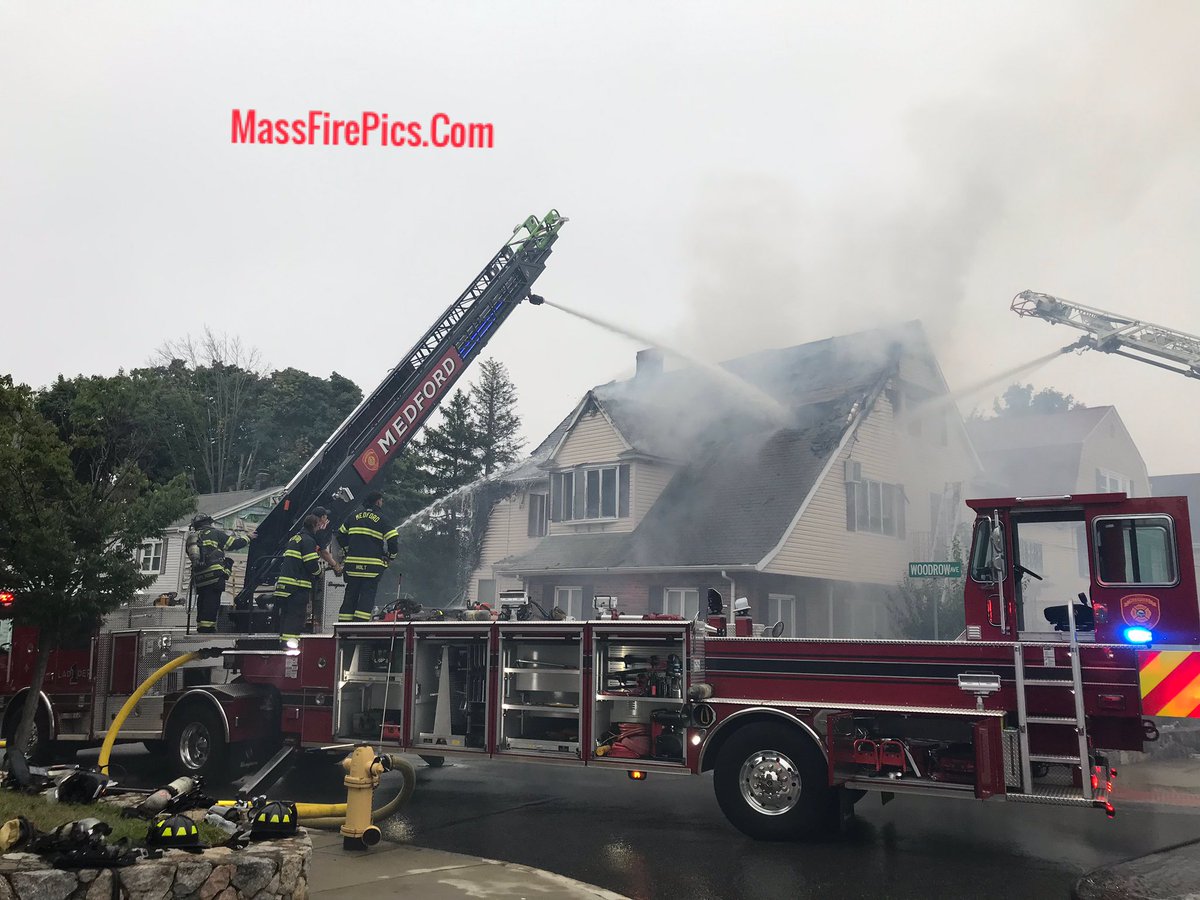 Medford Ma. Fire's new Ladder-1  Seagrave tiller working at the 2nd alarm at 129 Forest Street, Monday Morning Labor Day