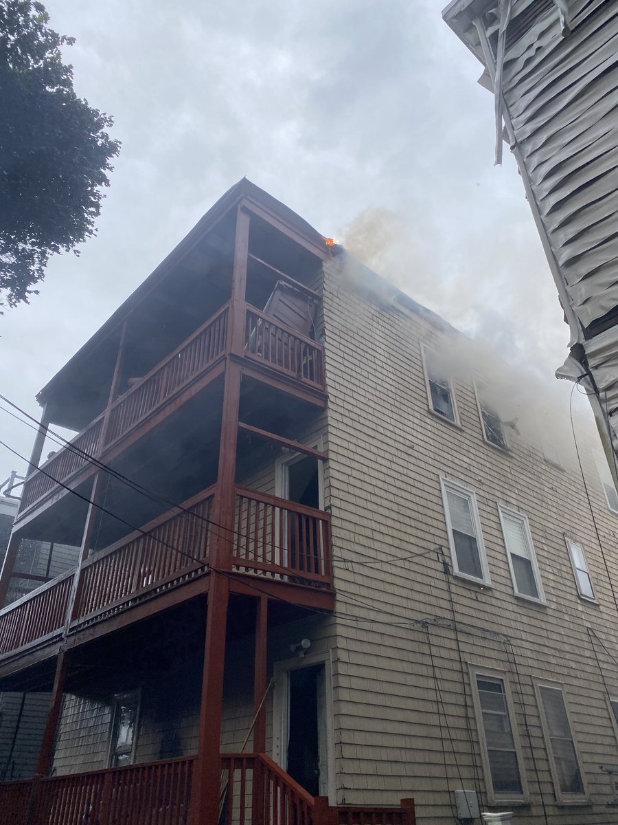 Boston Fire Dept.:The fire has traveled to multiple streets Peverell and Cushion Ave . The fire on CushionAve in in the 4rd floor and in the roof . All companies are working