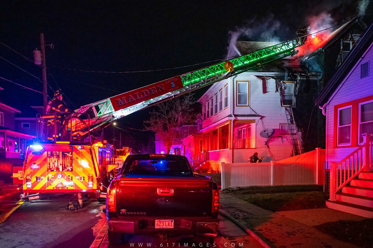 Malden - 24 John Street - Firefighters starting to clear the scene after a fire in a multi-family residence that sent 2 firefighters to the hospital with minor injuries after being caught in a possible flashover. 9 residents displaced at this time