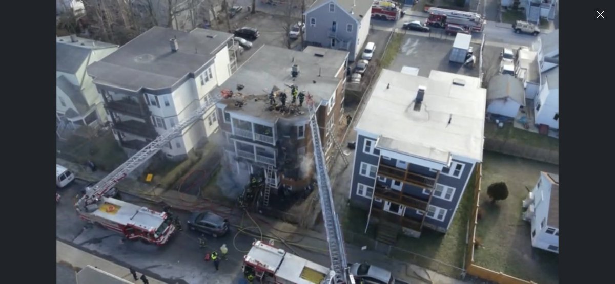 Boston Fire Dept.:All companies working at 2nd alarm fire at 74 Mora St Dorchester. The 3 story wood frame has fire on all floors. Several residents rescued