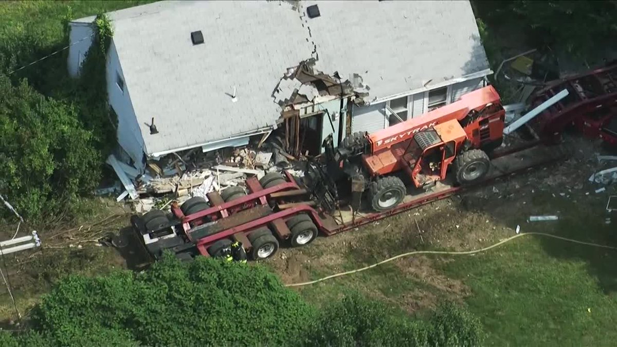 Truck driver in critical condition after crashing into this vacant Massachusetts home, officials just announced