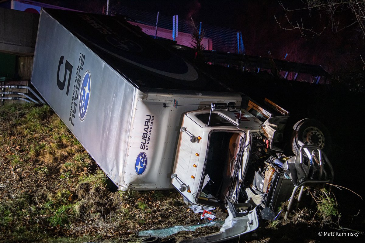 FOXBORO, MA - Earlier this evening just after 9:00 PM a semi truck traveling on 95 SB in Foxboro crashed through a barrier and rolled over off the highway, down onto Cocasset St in Foxboro
