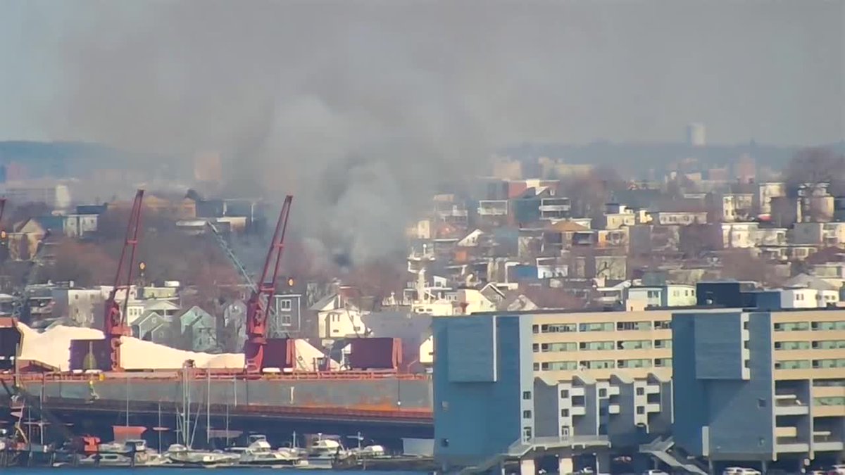 A plume of heavy smoke rising from a fire happening now in a Chelsea neighborhood is visible on several of our cameras in Boston