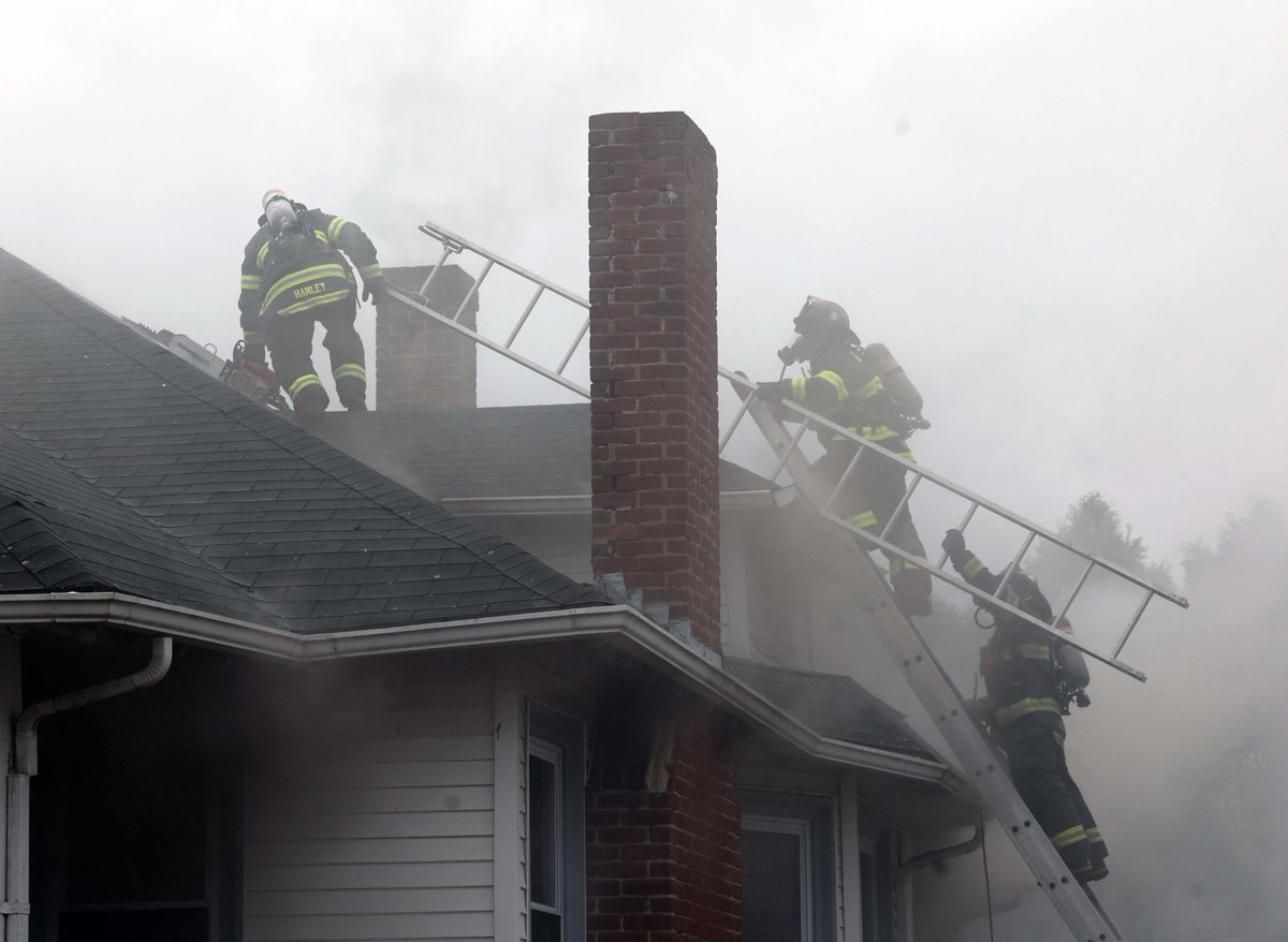 Two people including a firefighter taken to the hospital during a Brockton house fire at 549 North Warren Avenue