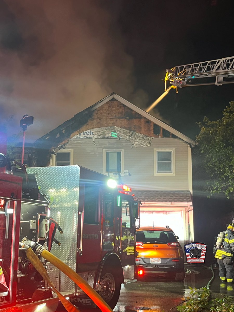 Georgetown Fire Department received a 911 call for reports of a outside fire extended into a garage on arrival crews found heavy fire showing from a garage extending into a 1 Sty wood residential  structure a 2nd was struck shortly after and quickly went to 4 alarm