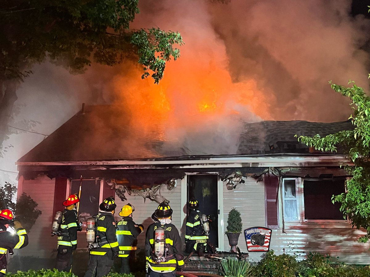 Georgetown Fire Department received a 911 call for reports of a outside fire extended into a garage on arrival crews found heavy fire showing from a garage extending into a 1 Sty wood residential  structure a 2nd was struck shortly after and quickly went to 4 alarm