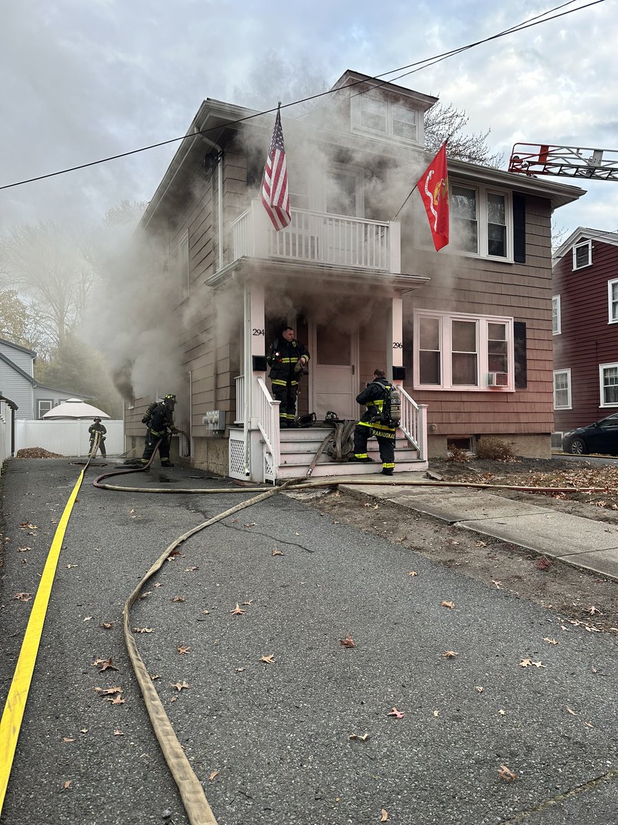 Fire showing on arrival at 294 Neposet Valley Pkwy.  Smoke pushing out all windows