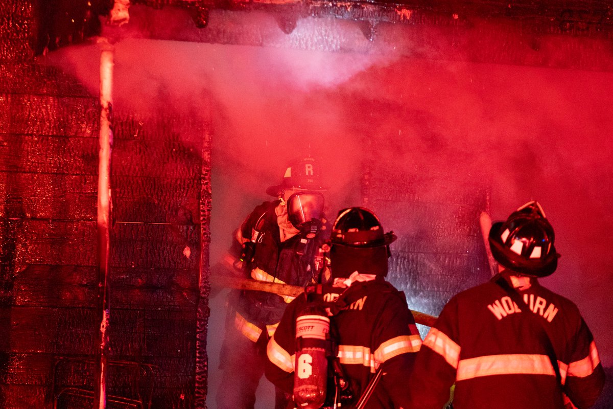 A 2-Alarm blaze ripped through a Woburn Home last night, bringing numerous mutual aid companies to the scene. Companies arrived to heavy fire from the first floor of the 2.5 story house which extended up into the attic