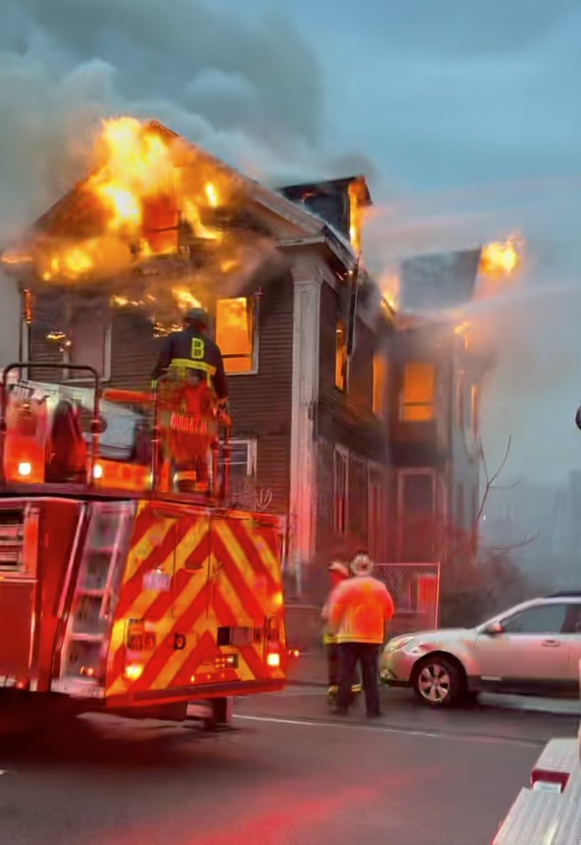 Heavy fire engulfing the 2nd and 3rd floors at the 2 alarm fire this morning on Columbia road Dorchester