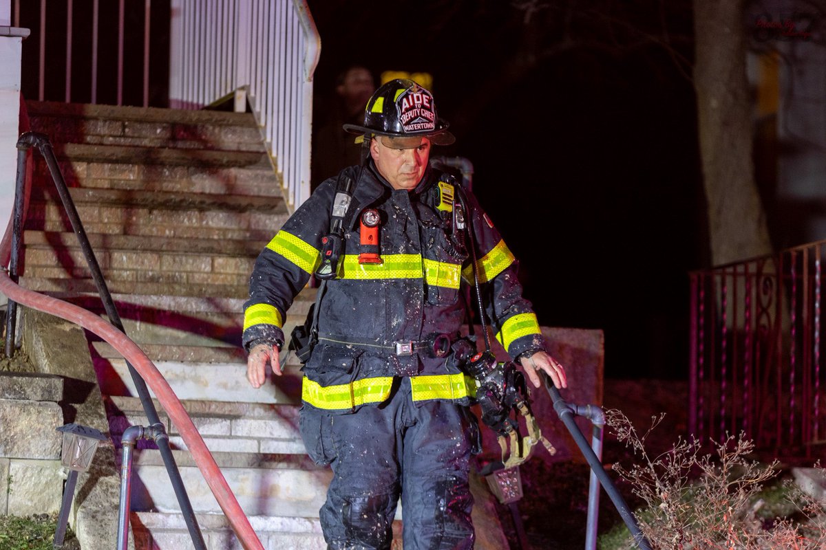 Watertown Firefighters open up at a working fire earlier tonight. Fire was located in the ceiling/insulation between the 2nd floor and the attic of a 2.5 sty woodframe on Keenan St