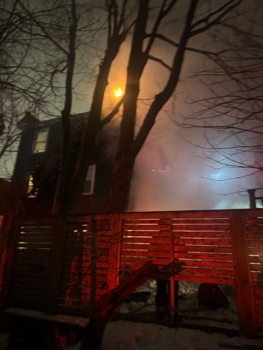 heavy fire in an occupied 3 story house at 98 Wyman st.The fire extended to the adjacent house at 100 Wyman .A 2nd and 3rd alarm was ordered