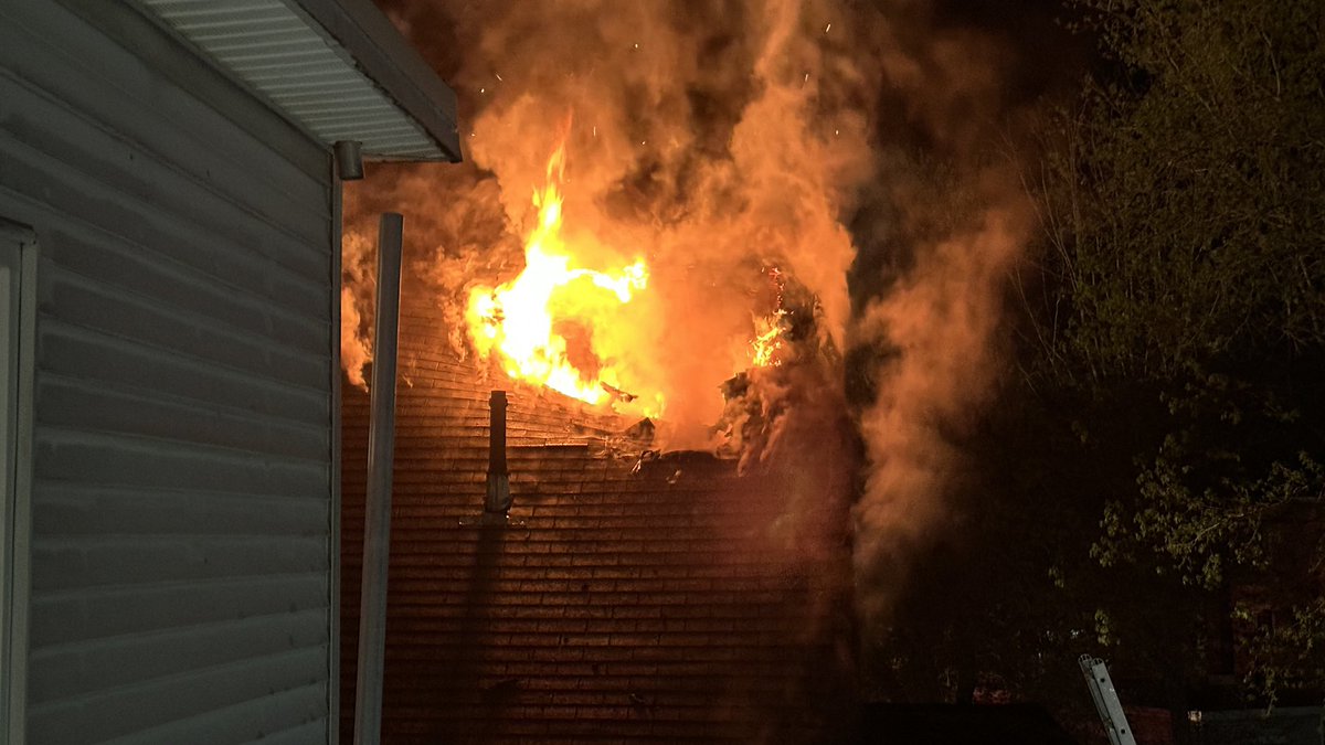 Heavy fire through the roof at the 3rd alarm in Southbridge now