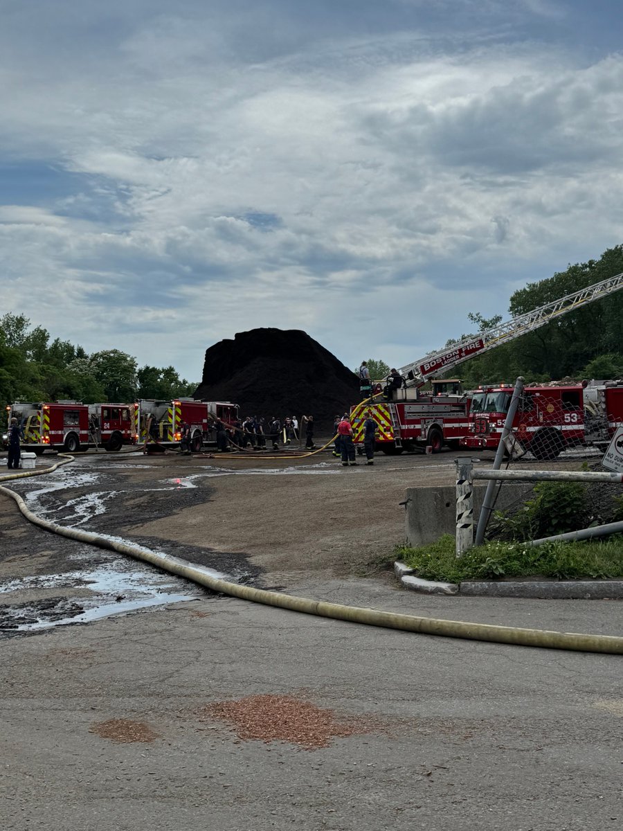 Firefighters are working at a large mulch fire at the landscape company on American Legion Hwy. Firefighters used 1000’s of feet of hose line to supply water to the fire. 